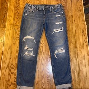 Silver ripped boyfriend blue jeans. Never worn.